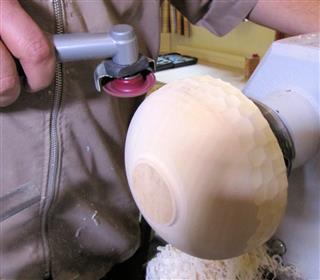 Texturing a bowl. His third project of the day